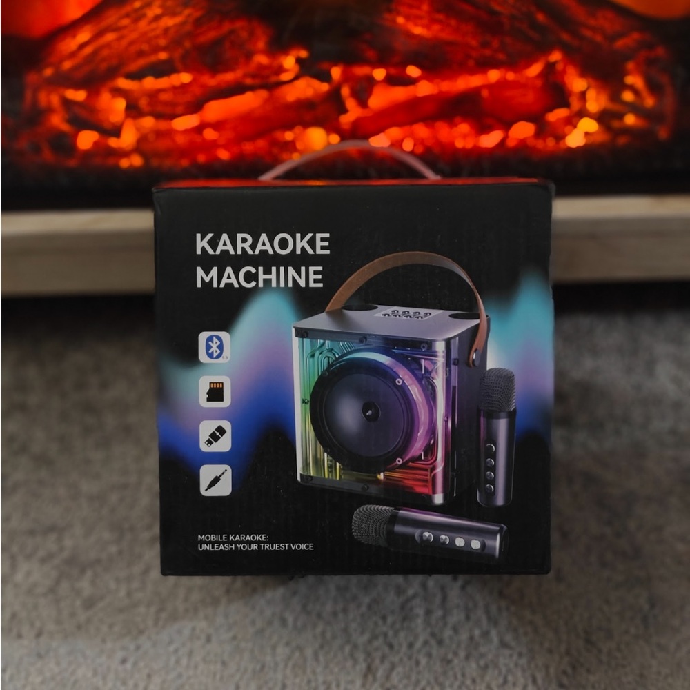 Black Portable Speaker with LED Lighting and High-Tech Design